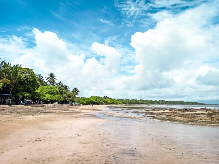 Empty Tamarindo beach on a sunny day, a popular tourist destination you shouldn't miss on your 10 day Costa Rica itinerary
