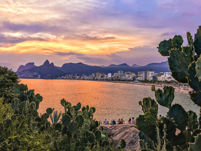 Sunset view from Arpoador cliff in Rio de Janeiro, a must-see place if you're exploring Brazil in 10 days