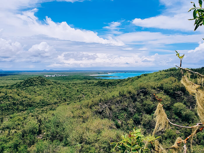 A view over Isabela Island from the Wall of Tears, one of the best Galapagos land based tours to take.