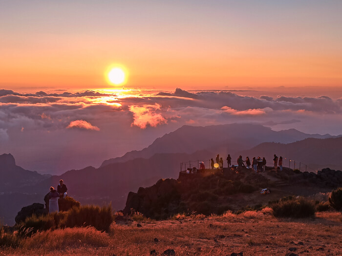 People watching the sunrise at Pico do Arieiro mountain, one of the highlights of this 7-day Madeira itinerary
