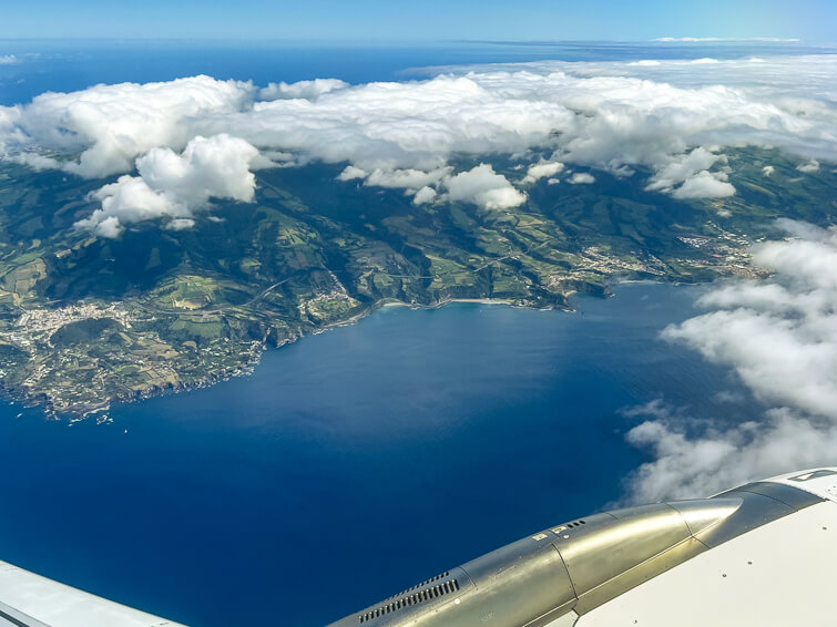 A view of the south coast of Sao Miguel from the window of an airplane