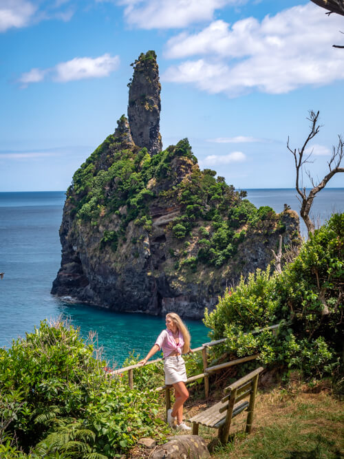 Me enjoying the ocean views at Baia da Alagoa with a large sea stack in the background.